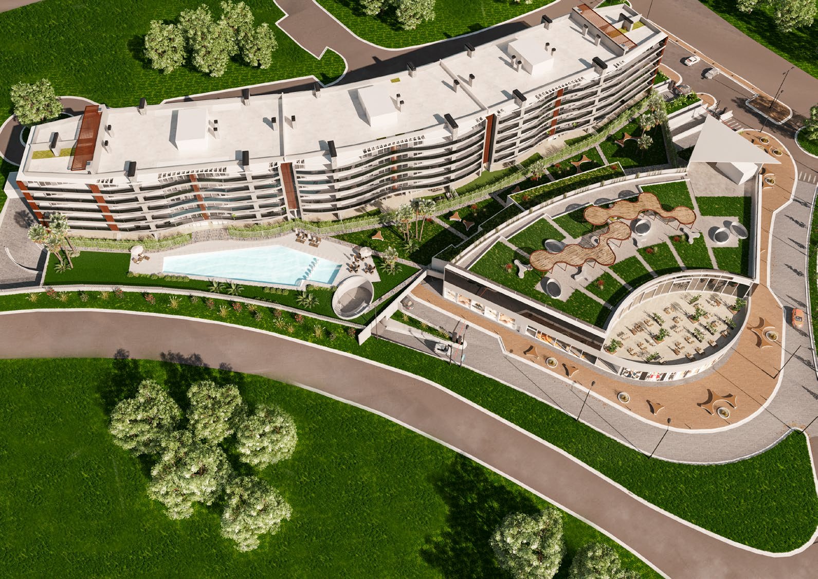 Vista aérea del conjunto Torres Zafiro con parque, piscina y frente comercial