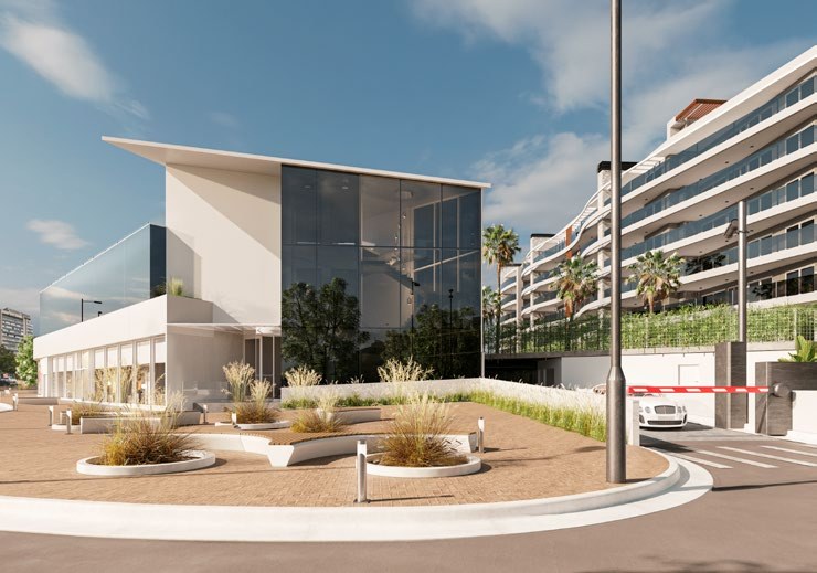 Plaza de acceso y locales